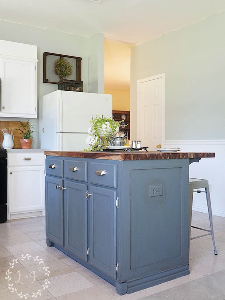 blue kitchen island with custom trim end panel