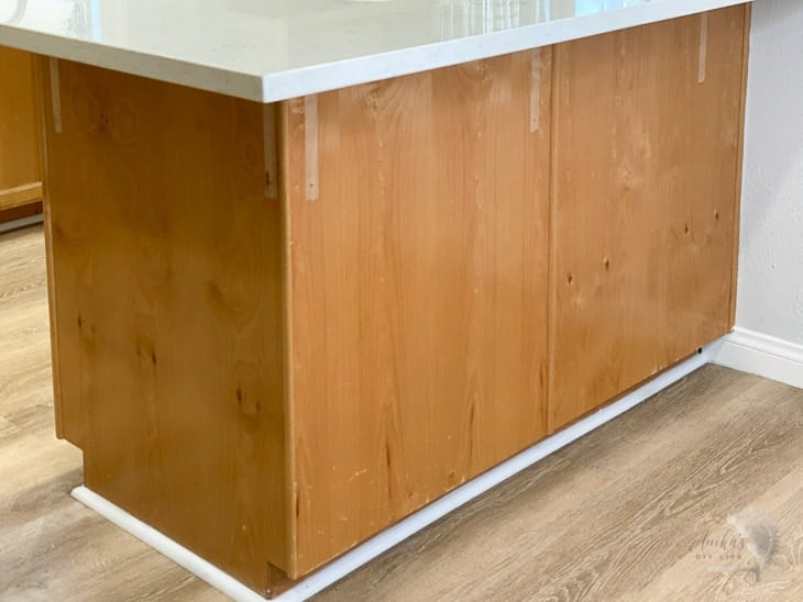 Brown before of kitchen island.