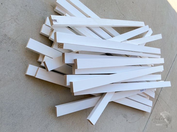 pile of cut up wood slats for island trim