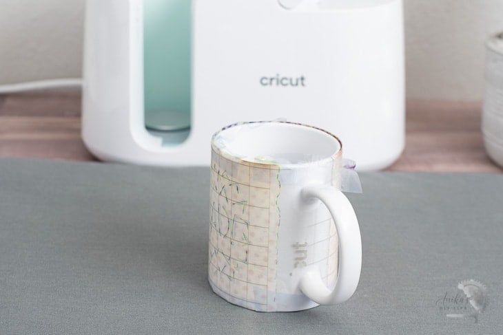 Mug cooling after being made in the Cricut MugPress