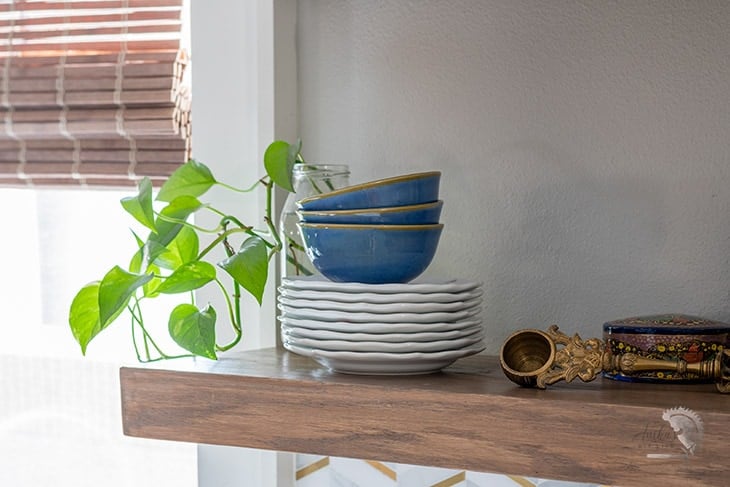 DIY gloating wood shelves in a kitchen