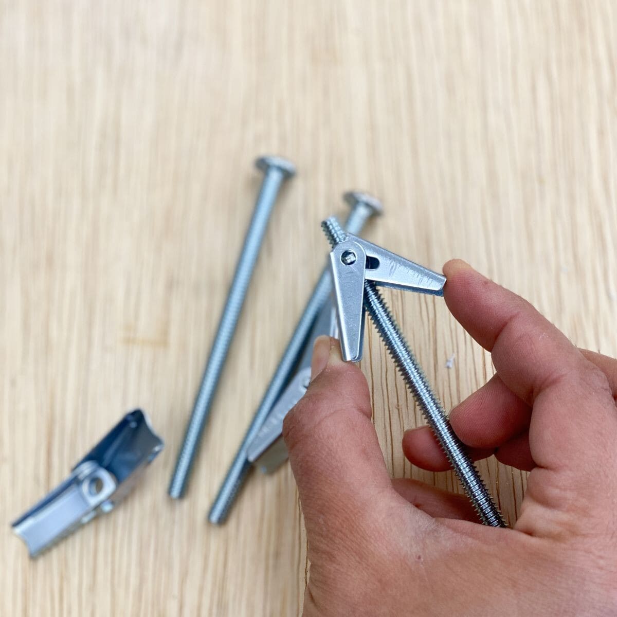 Toggle bolts are the strongest way to anchor heavy items to hollow walls. Learn how to install toggle bolts correctly and easily.
