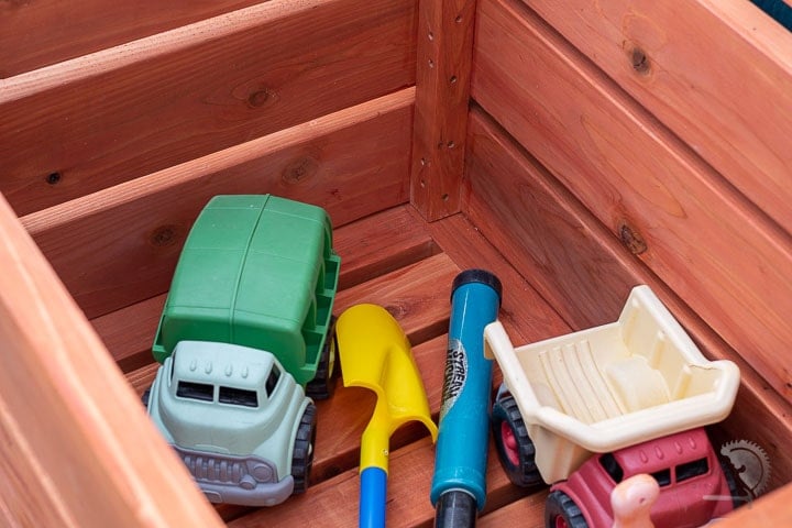 Toys inside the outdoor DIY storage box
