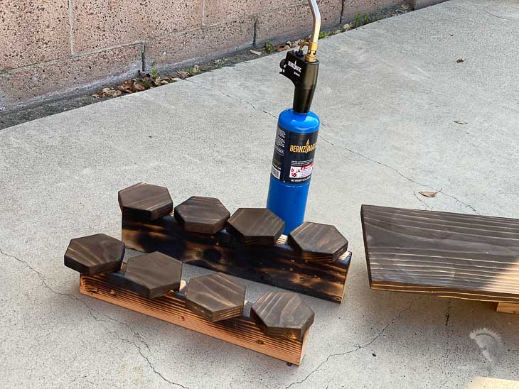 wood burnt boards and Bernzomatic torch