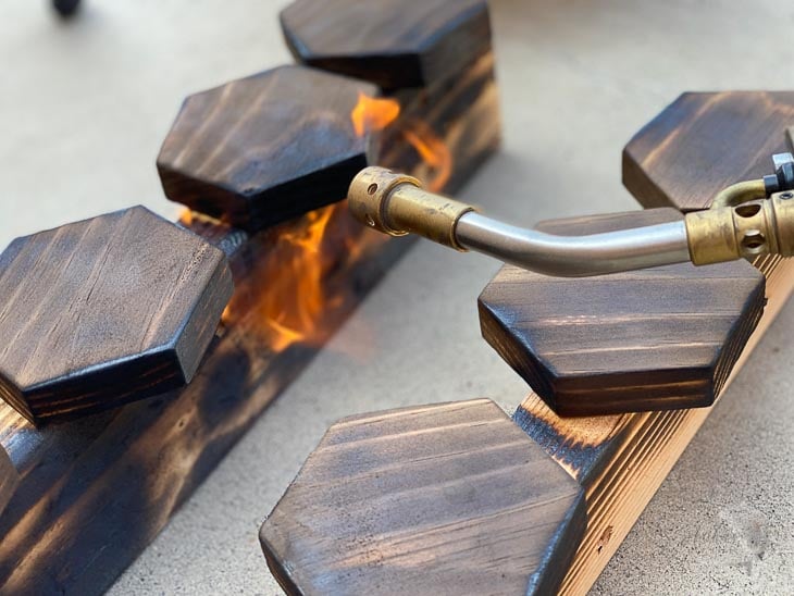 torching wood using a blow torch