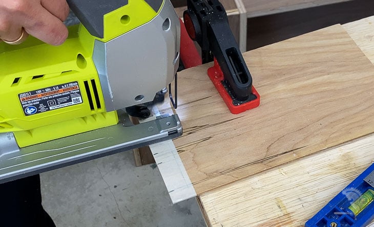 Cutting slots in the necklace display stand