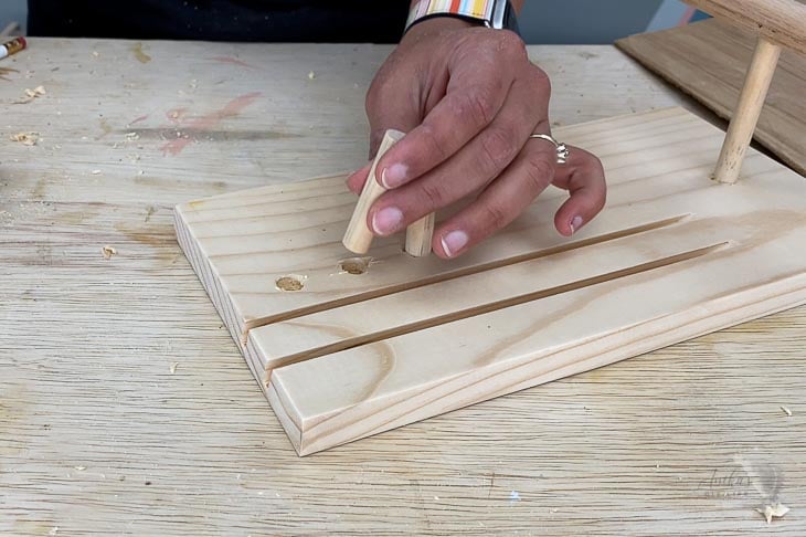 Adding dowels for ring holders on the DIY jewelry display stand