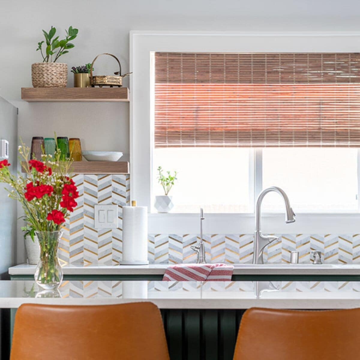 A complete remodel of an old brown kitchen to turn it into a show-stopping gorgeous green and white dual-toned kitchen!