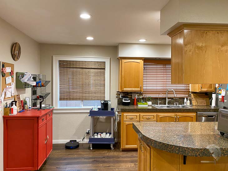 Kitchen before - with lots of old brown cabites