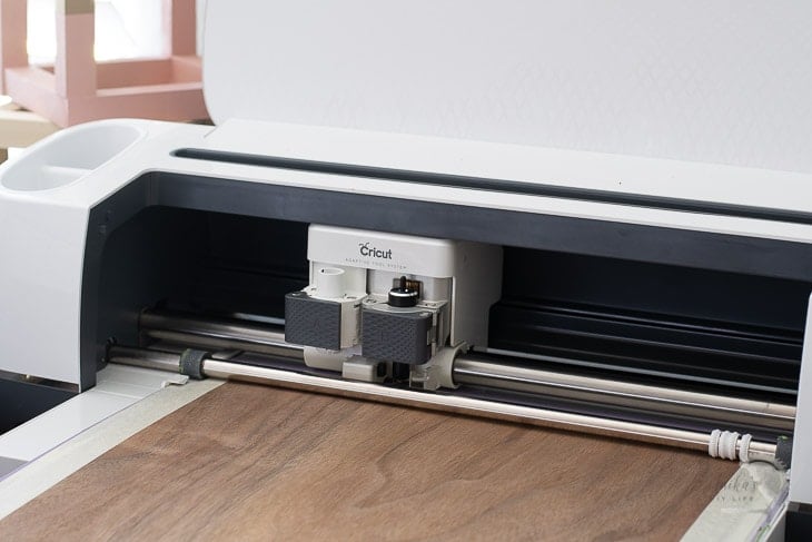 Cricut machine cutting walnut veneer for diy dresser drawer fronts