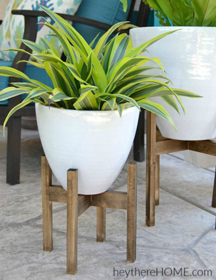 wood DIY plant stand with plant in white pot