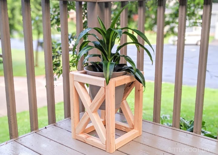 wooden DIY plant stand with X detail