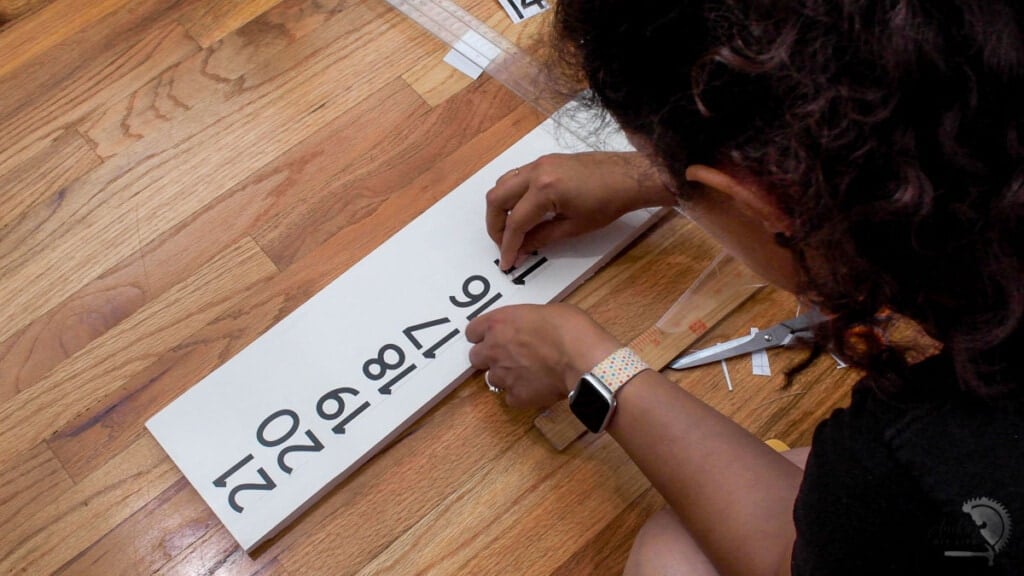 Applying numbers to the cornhole board scorekeeper