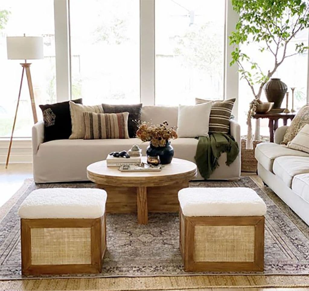 living room with two ottomans made with cane webbing