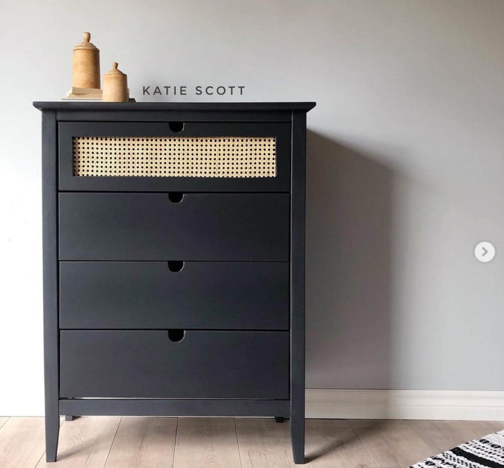 dresser makeover with dark paint and cane webbing on the front panel of the first drawer
