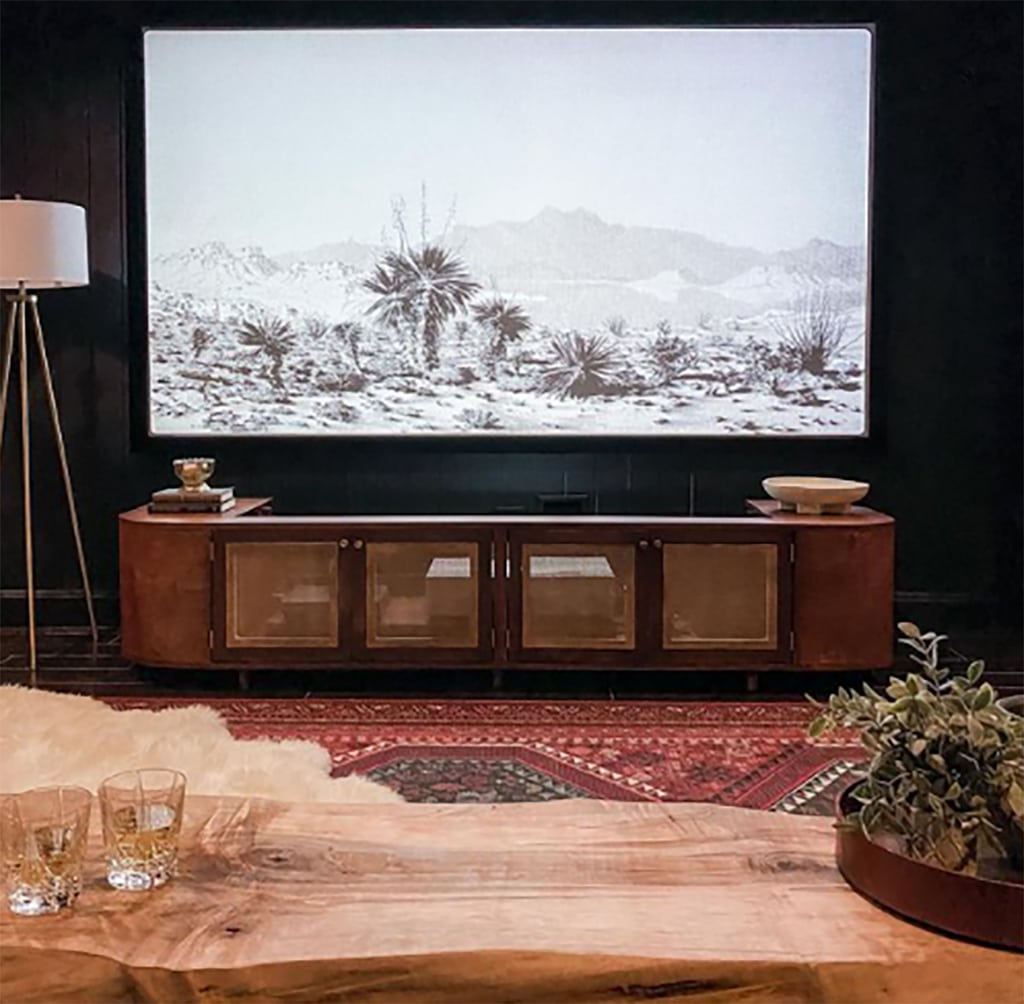 view of a diy media console with cane webbing drawer fronts under the tv