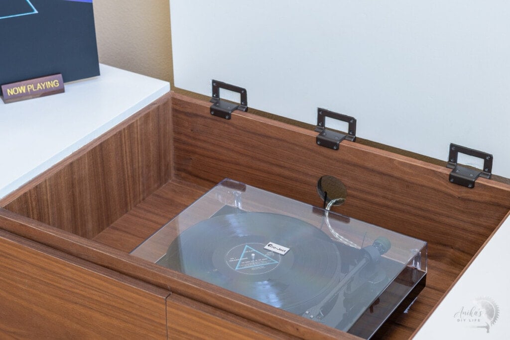 Record player compartment with record player inside it