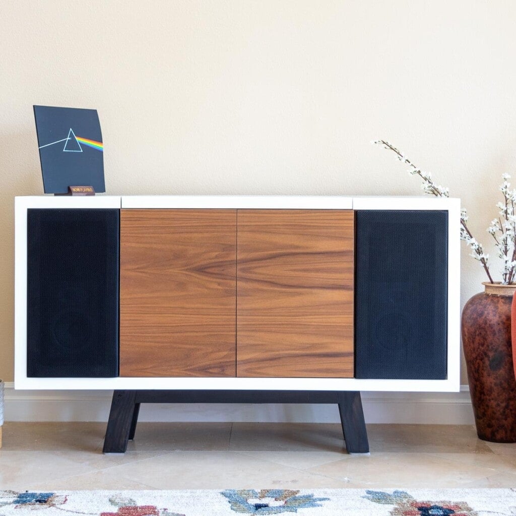 Learn how to build an amazing DIY record player stand with space for speakers and storage for vinyl records with detailed tutorial and plans.