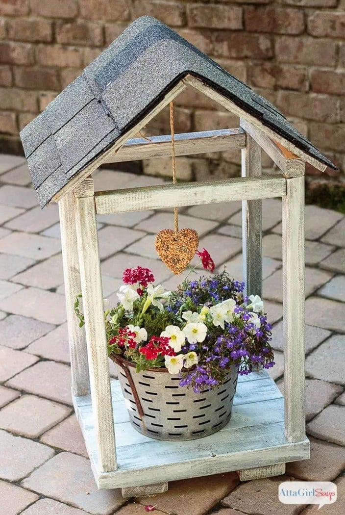 house shaped wooden bird feeder/plant atrium made from scrap 2x4s