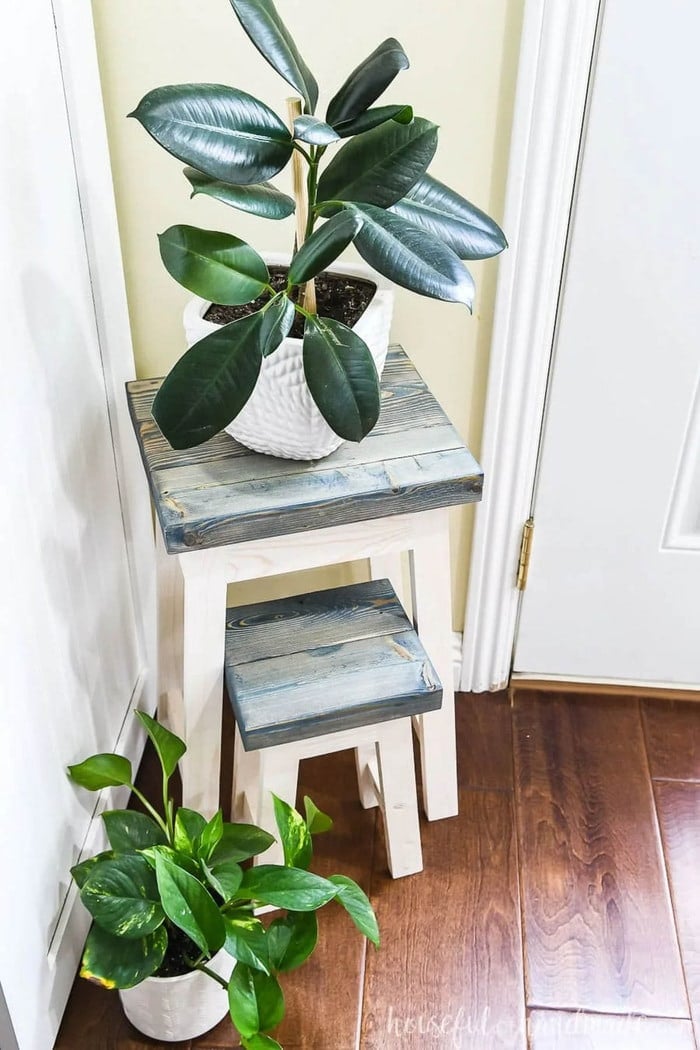 two plant stands made from scrap 2x4s