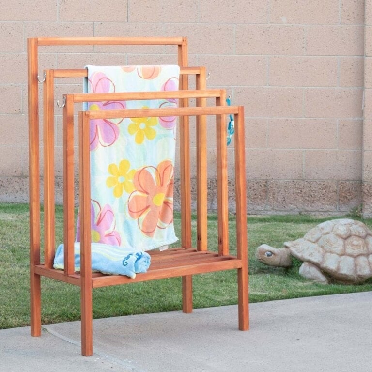 Learn how to build this easy DIY outdoor towel rack. It is a quick project with detailed tutorial, plans, and videos. It looks great too!