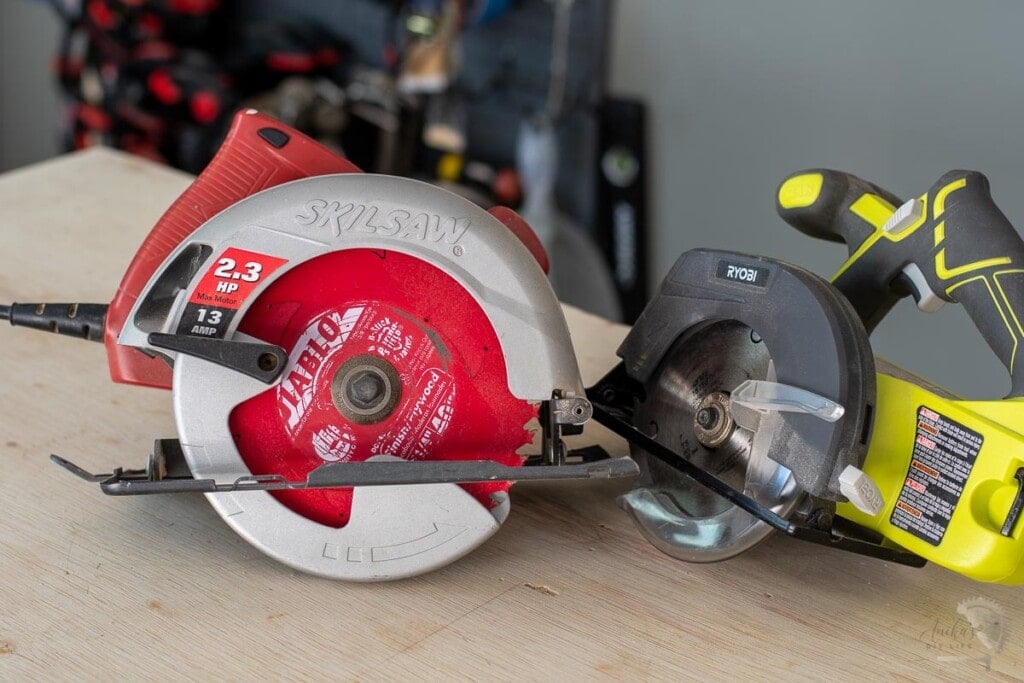 corded and cordless saw on a workbench