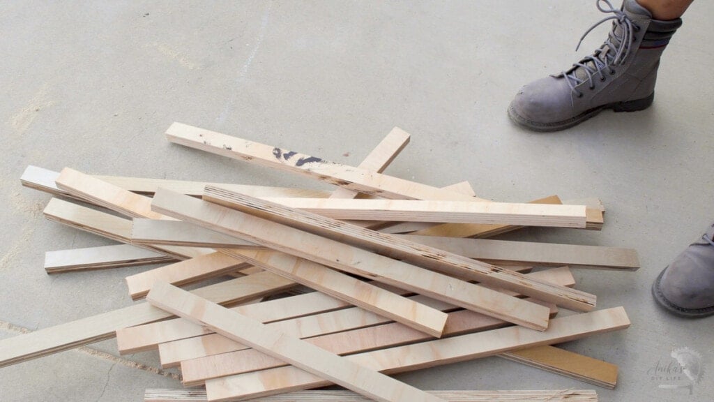 stack of plywood strips to be assembled into patterned plywood