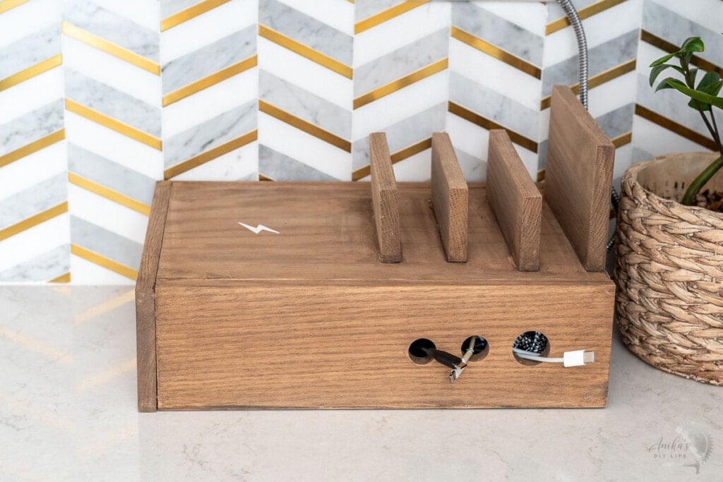 wooden device charging station on kitchen counter