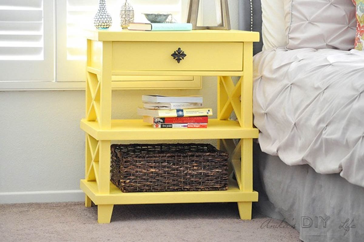 yellow painted night stand with drawer and two shelves