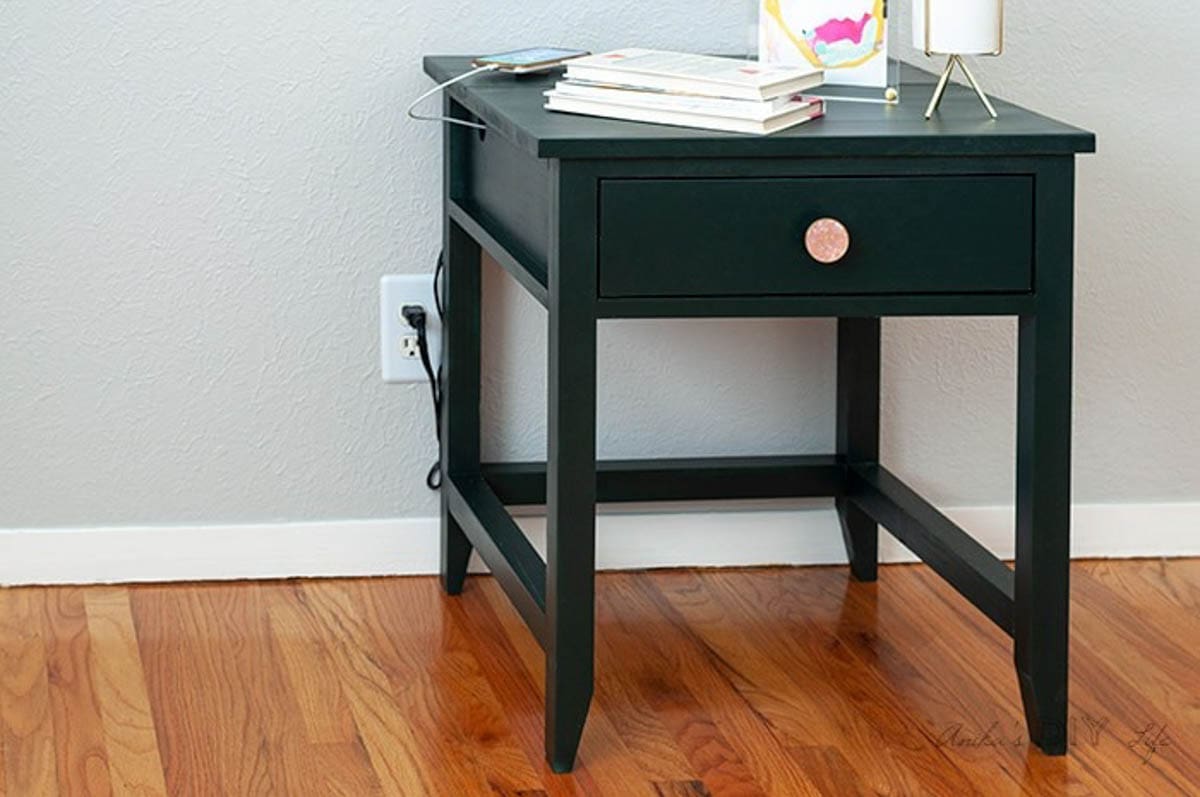 dark green painted end table with drawer