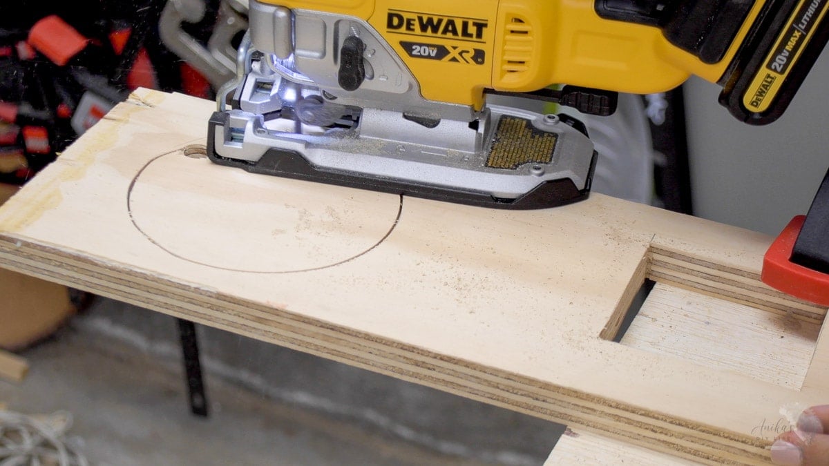 cutting a hole in a board with a jigsaw