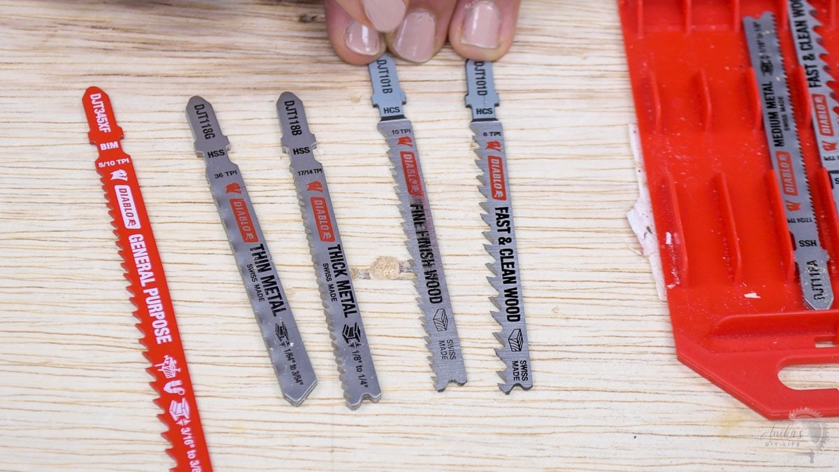 collection of various types of jigsaw blades