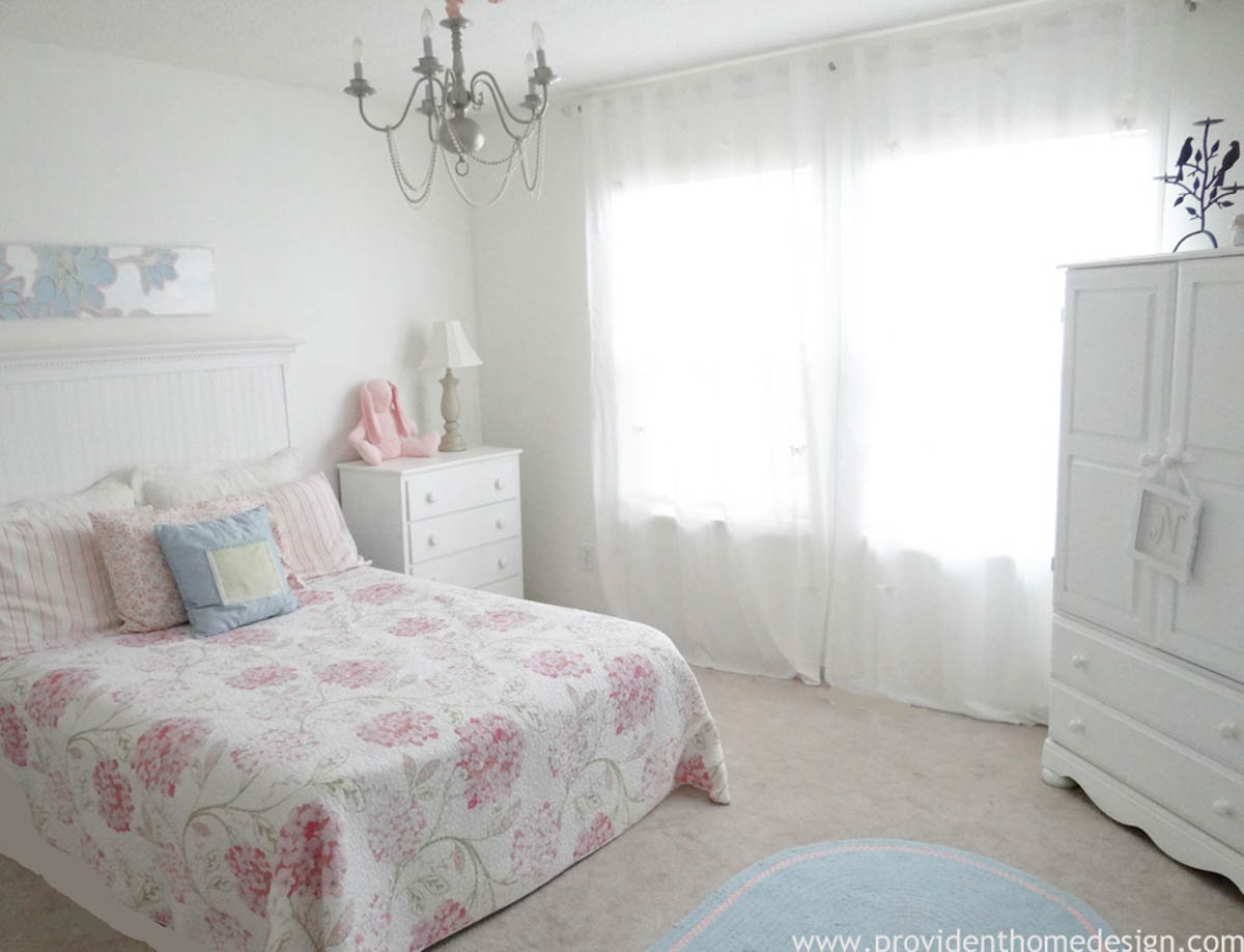 white beadboard headboard in little girls room