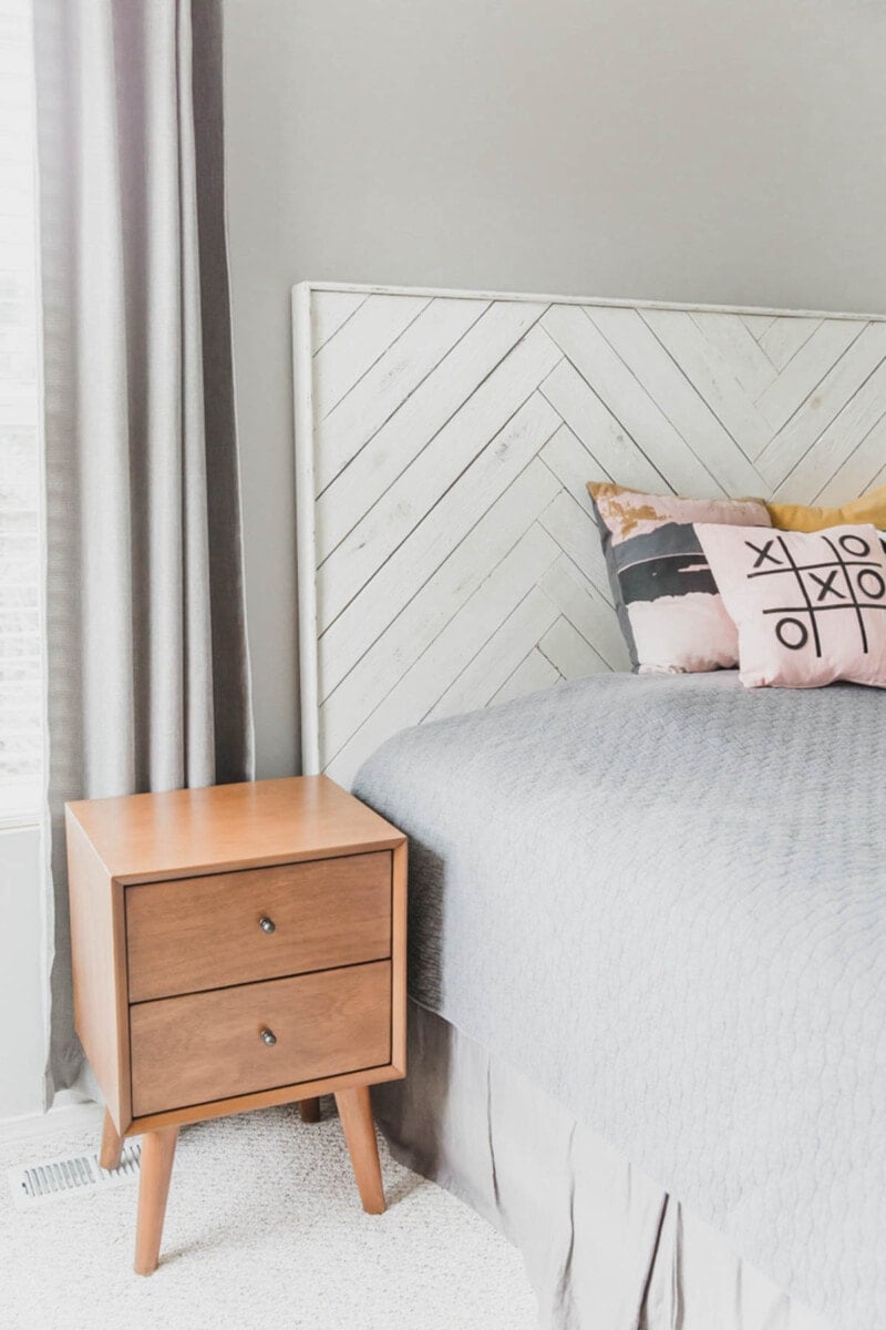White DIY wooden headboard idea using herringbone pattern
