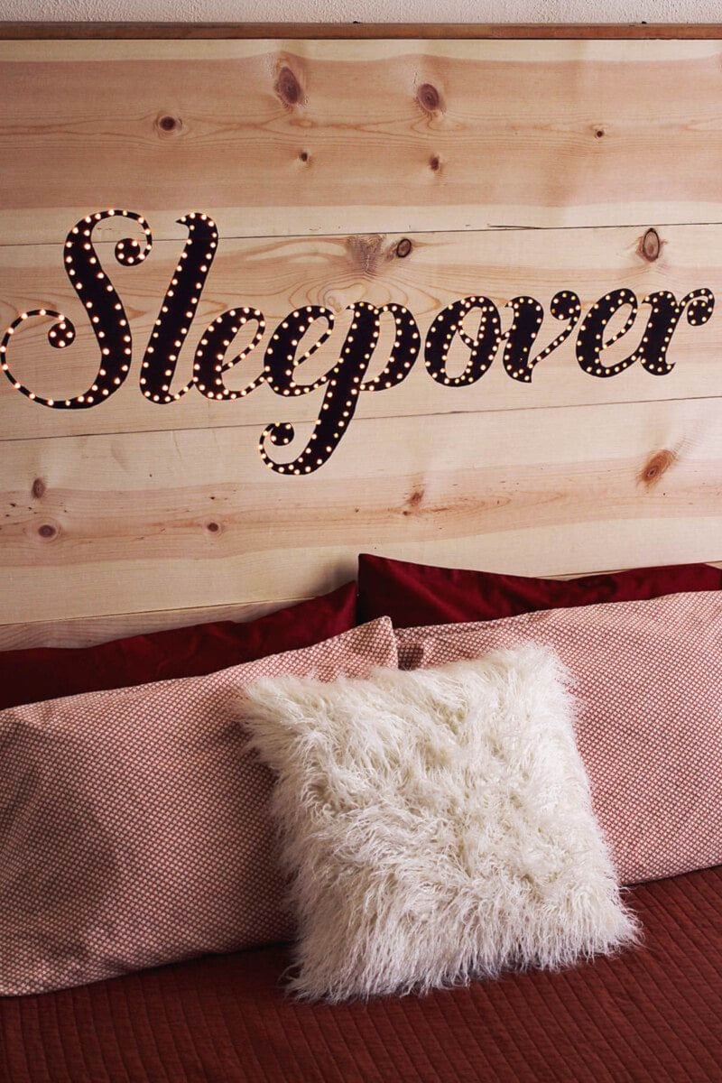 Wooden headboard with script word