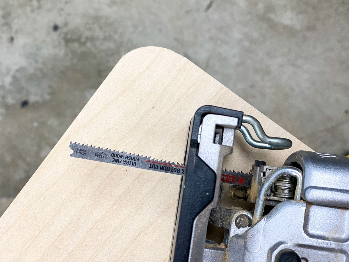 Jigsaw on top of curved cut plywood.