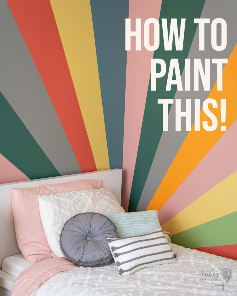 Full view of corner with sunburst accent wall with text overlay