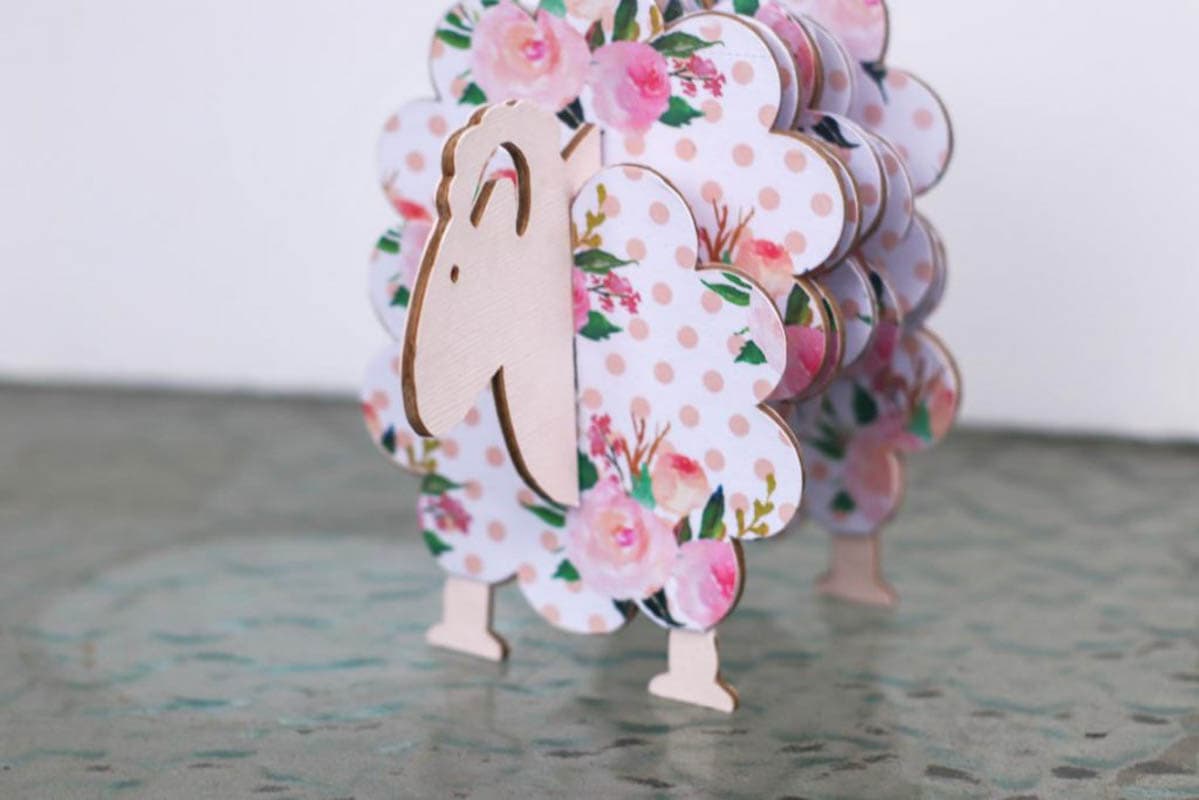Coasters in a coaster holder shaped like a sheep