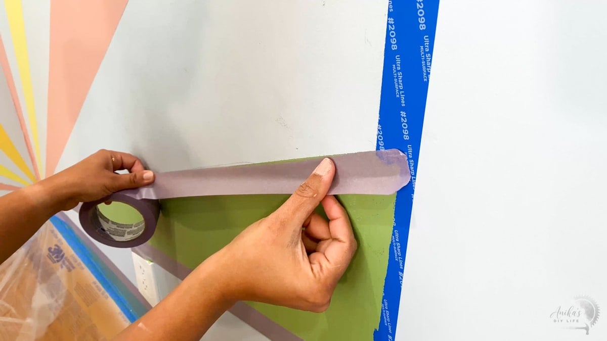 Woman applying second layer of tape
