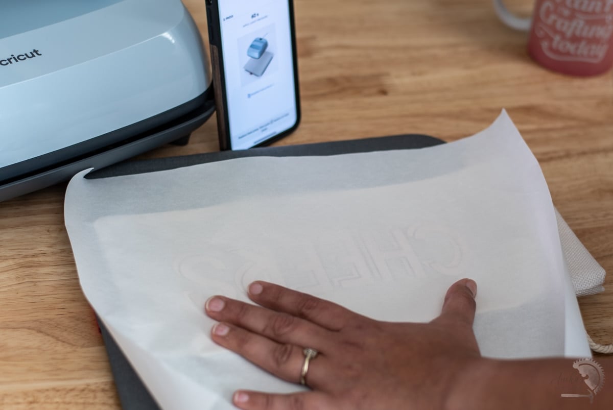 setting up the Cricut EasyPress 3 to transfer infusible ink to a wine bag