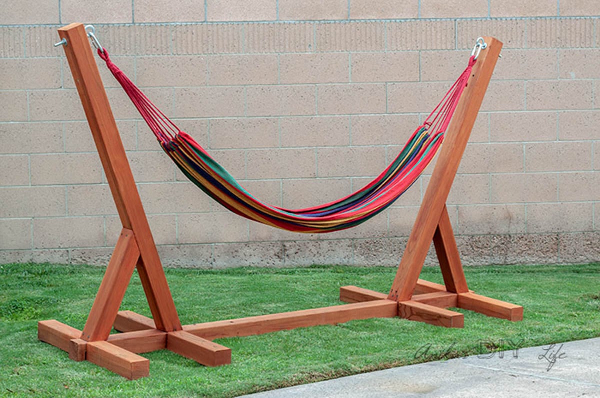 hammock stand made from redwood 4x4 boards in lawn with colorful hammock