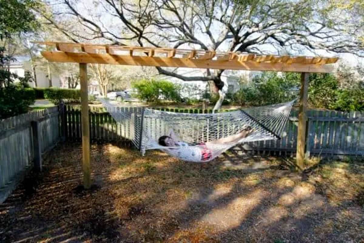 woman laying in DIY hammock stand