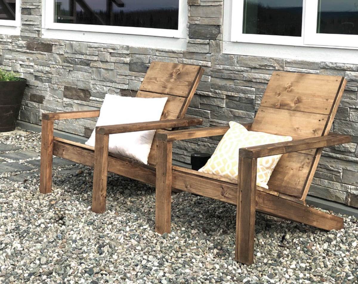 Two 2x4 adirondack chairs sitting in grave.