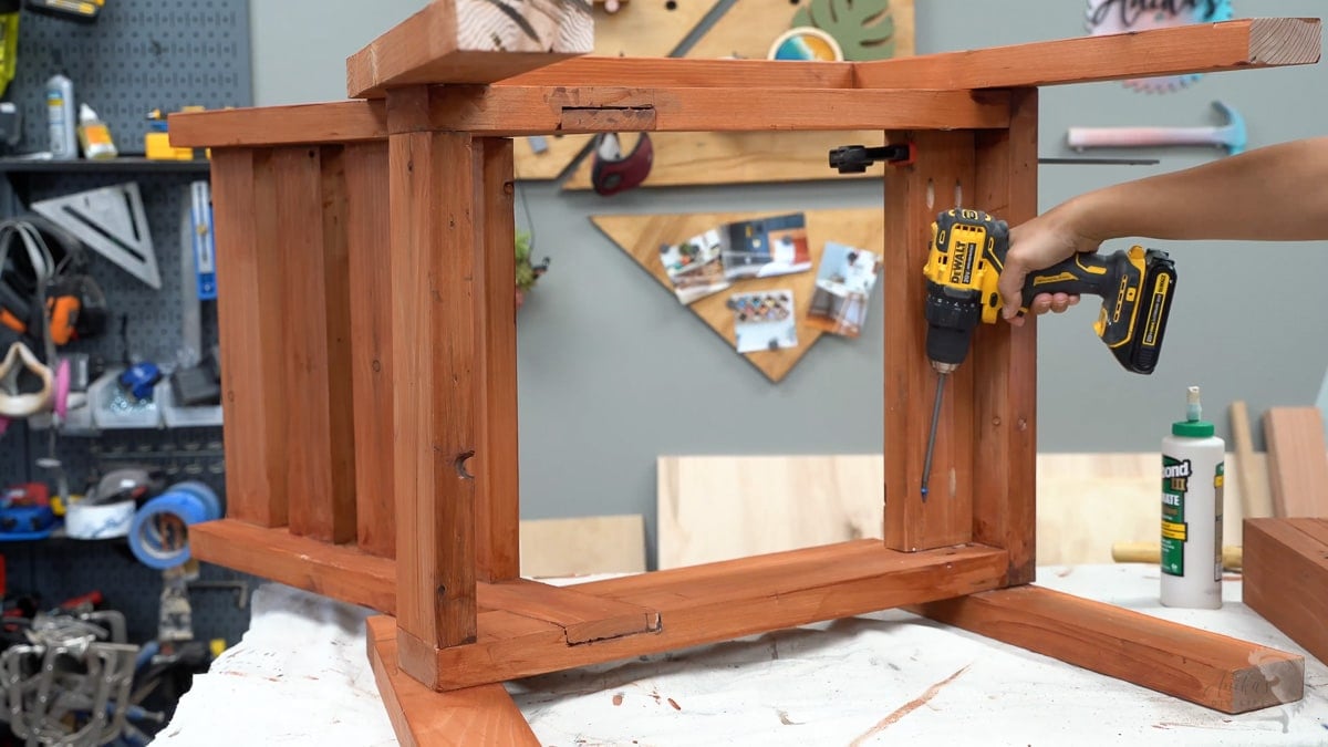 Woman adding the chair seat slats using pocket holes
