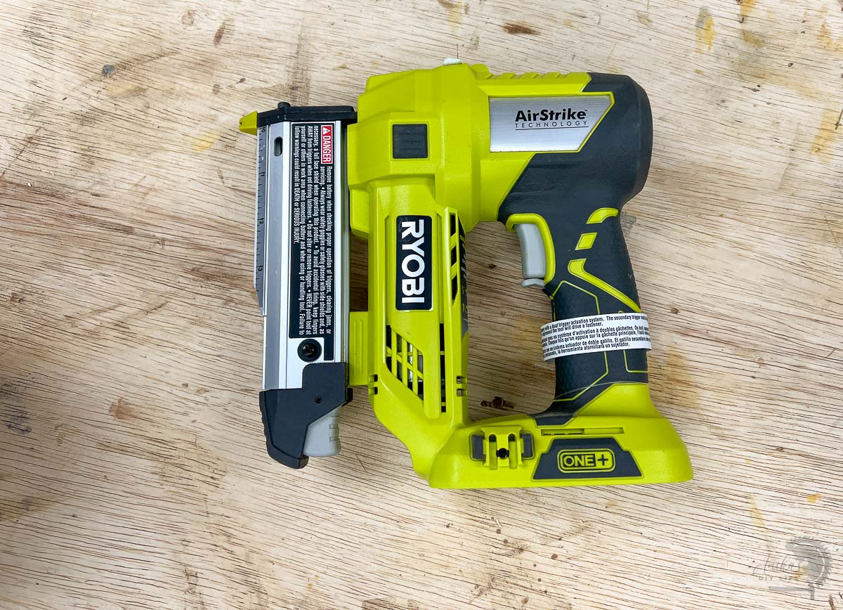 23-gauge pin nailer on workbench