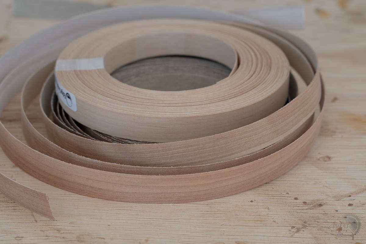rolls of edge banding on a workbench