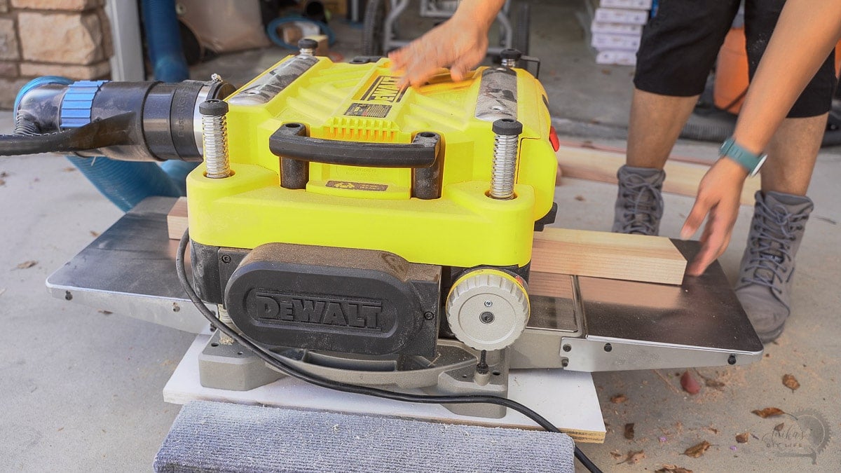 woman running planer on the floor