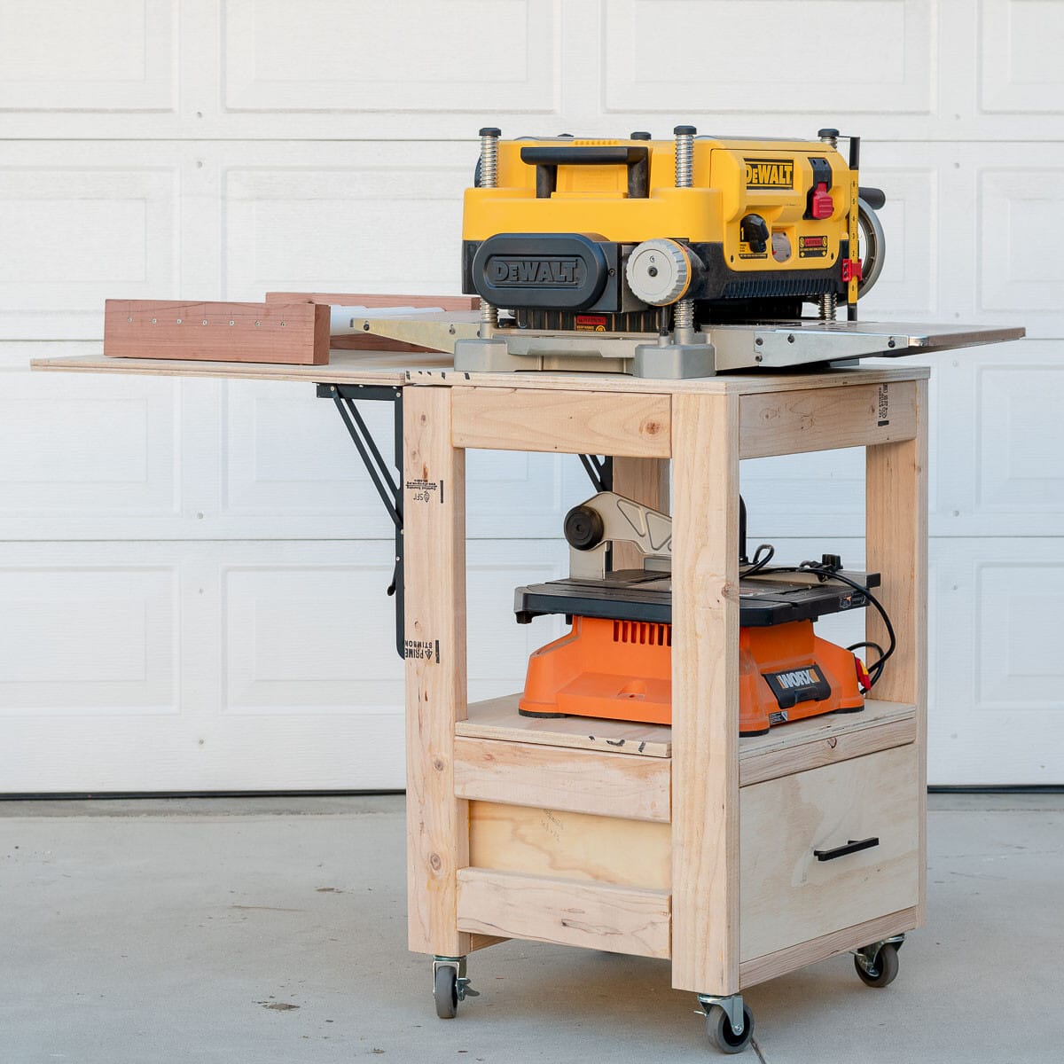 Planer stand with outfeed table open