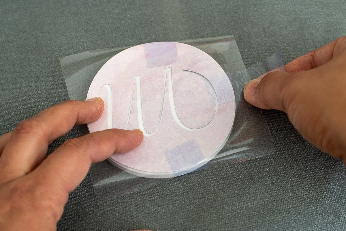 attaching the infusible ink sheet to the coaster