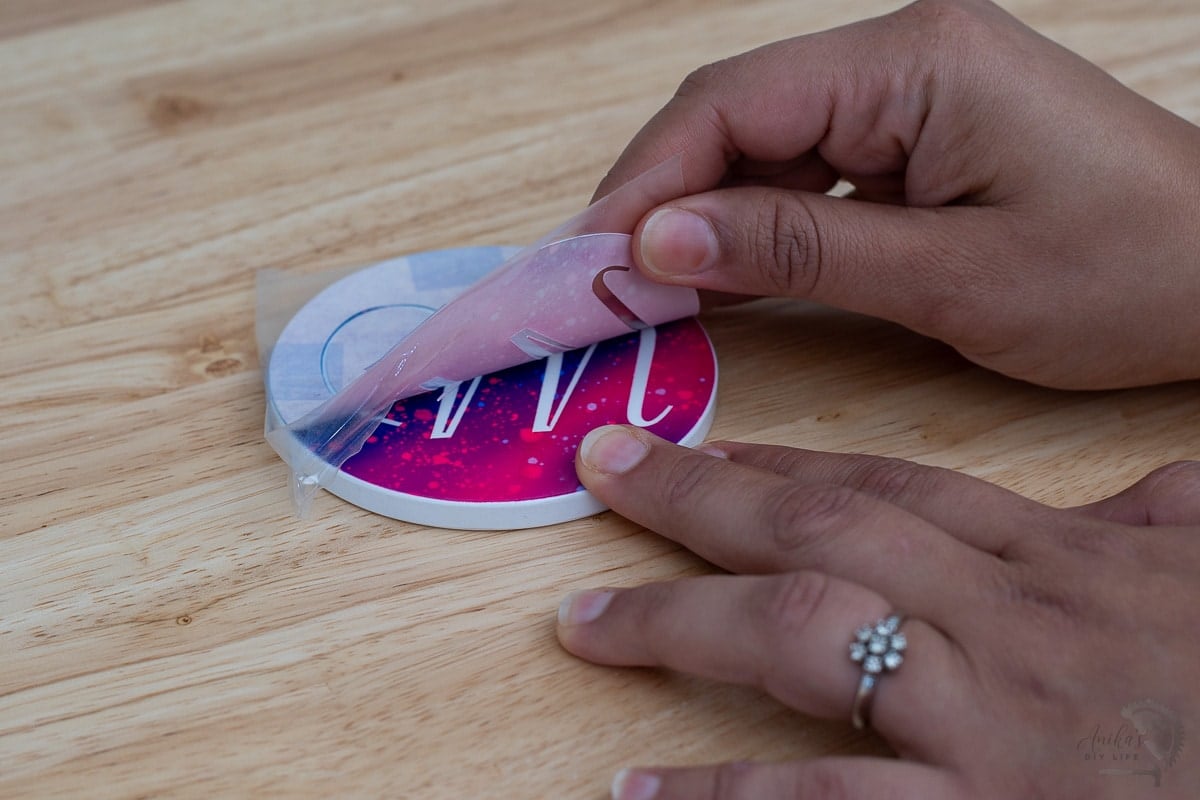 Removing infusible ink sheet from coaster
